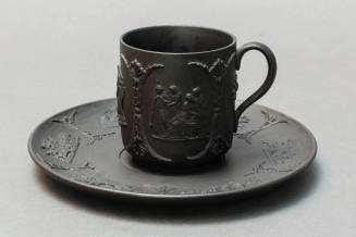Cup with saucer