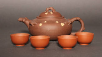 Teapot with lid and four cups