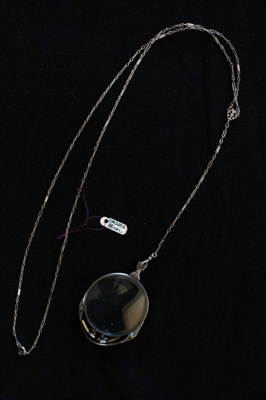 Eyeglasses, chain, and case