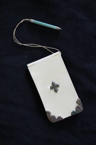 notepad and attached pencil