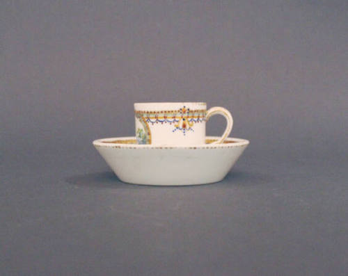 Demi-tasse cup and saucer