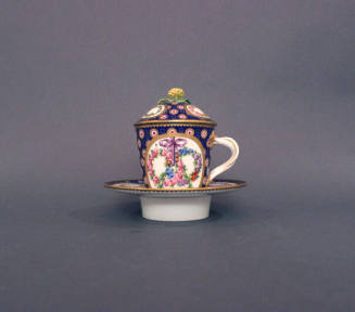 Cup, lid and saucer