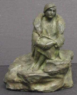 Charlotte Sitting on a Rock at a Picnic